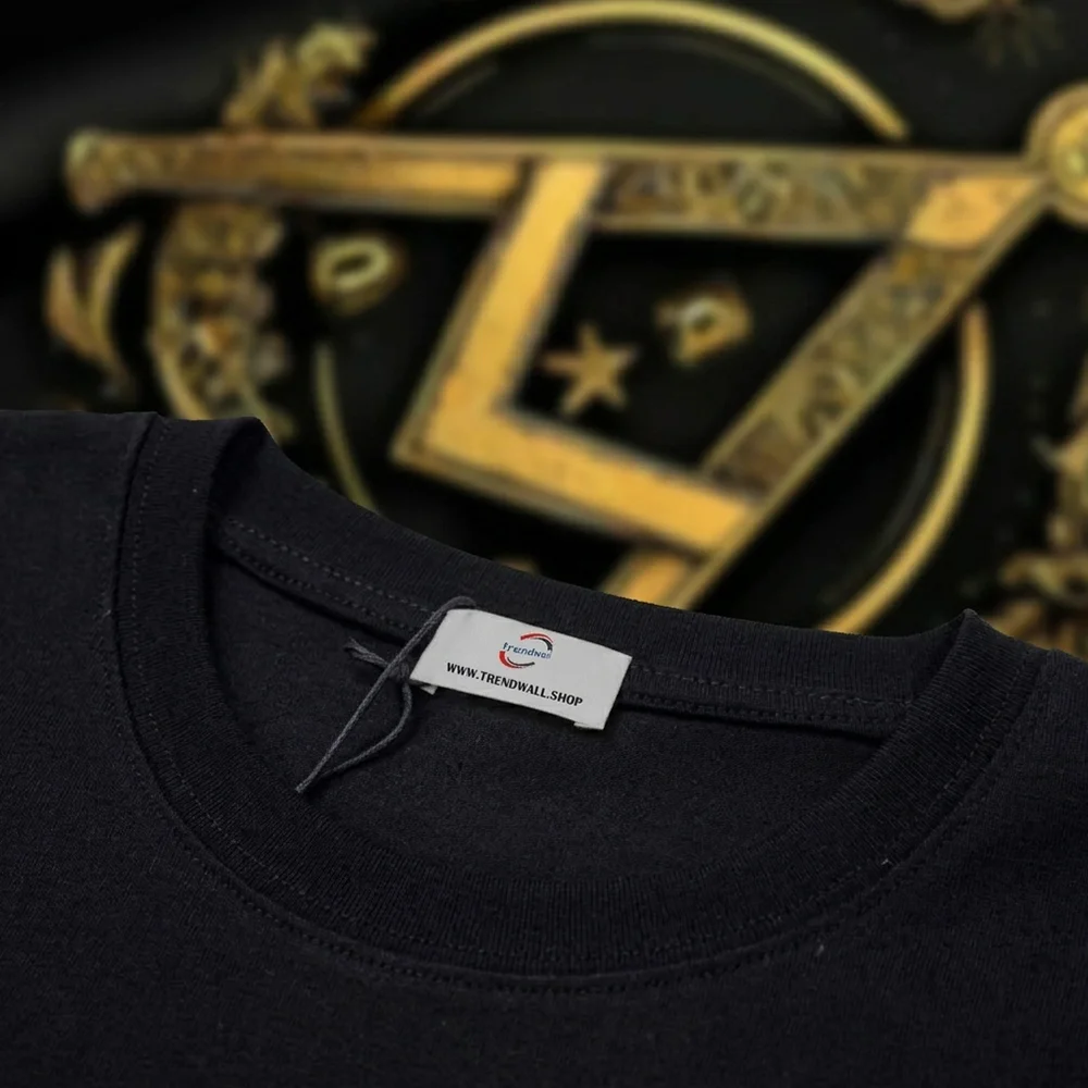 Black Freemason T-shirt with intricate gold Square and Compass, All-Seeing Eye symbolism, and personalized lodge name or custom name print.