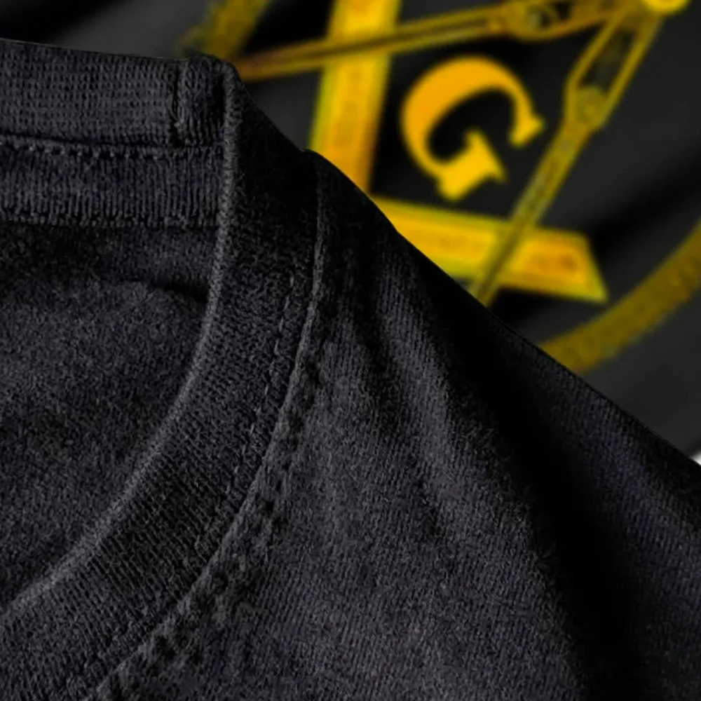 Black Freemason T-shirt with gold Square and Compass Freemasonry symbol for casual wear and gifting.