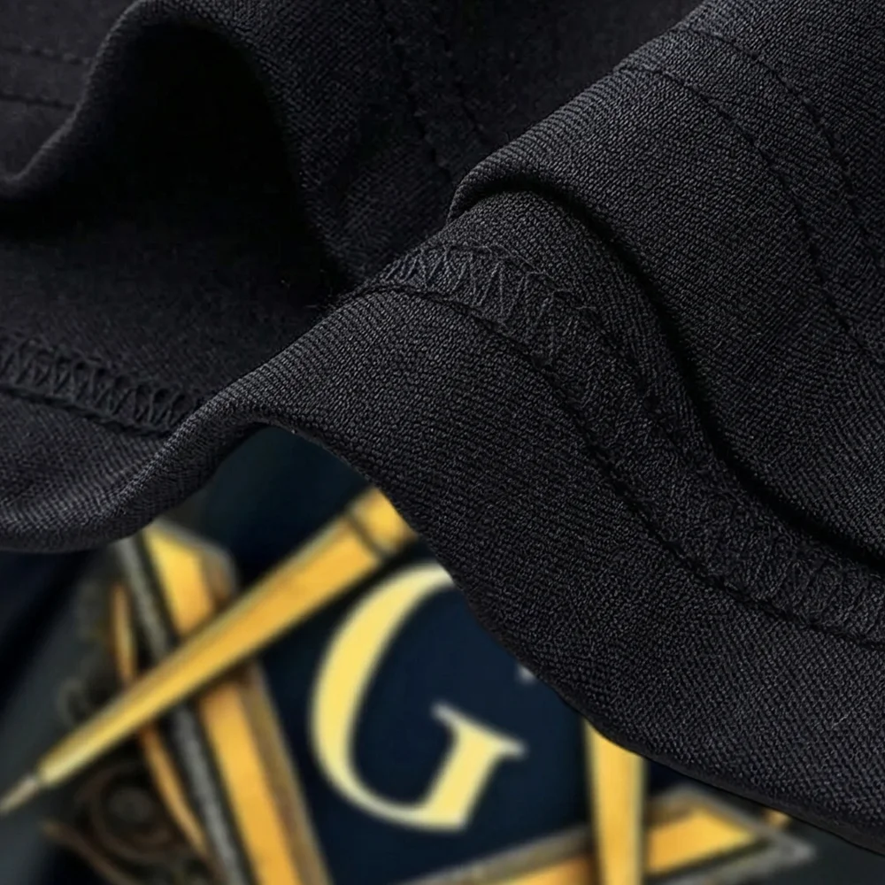 Custom black Masonic graphic shirt with gold Square and G artwork and personalized lodge name or individual text.