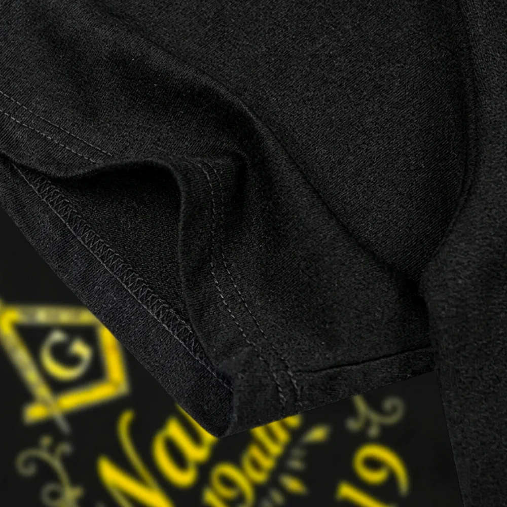 Masonic black T-shirt with gold symbol graphic, suitable as a gift for Freemasonry enthusiasts.