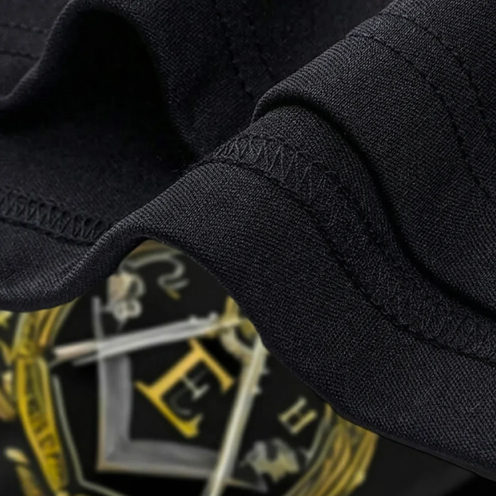 Custom Masonic Lodge T-Shirt featuring gold E letters and a symbolic Freemason design.
