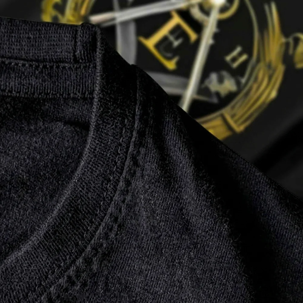 Masonic T-Shirt with gold E letters and emblem design, customizable for Freemason lodge members.