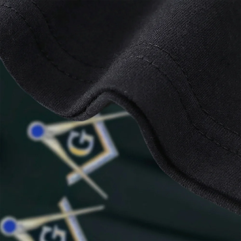 Black Masonic graphic shirt with gold Square and Compasses emblem and customizable lodge or name text.