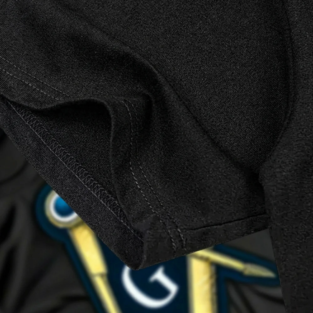 Custom black Masonic T-shirt with gold and blue Square and Compass design for personalized Freemason gifts.