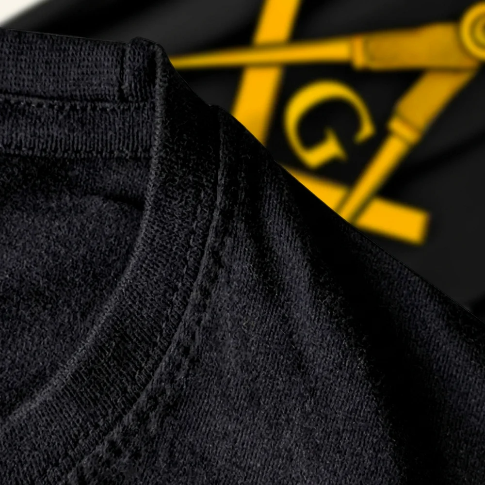 Masonic T-Shirt with gold Square and Compass symbol, decorative graphic design, and custom name printing.