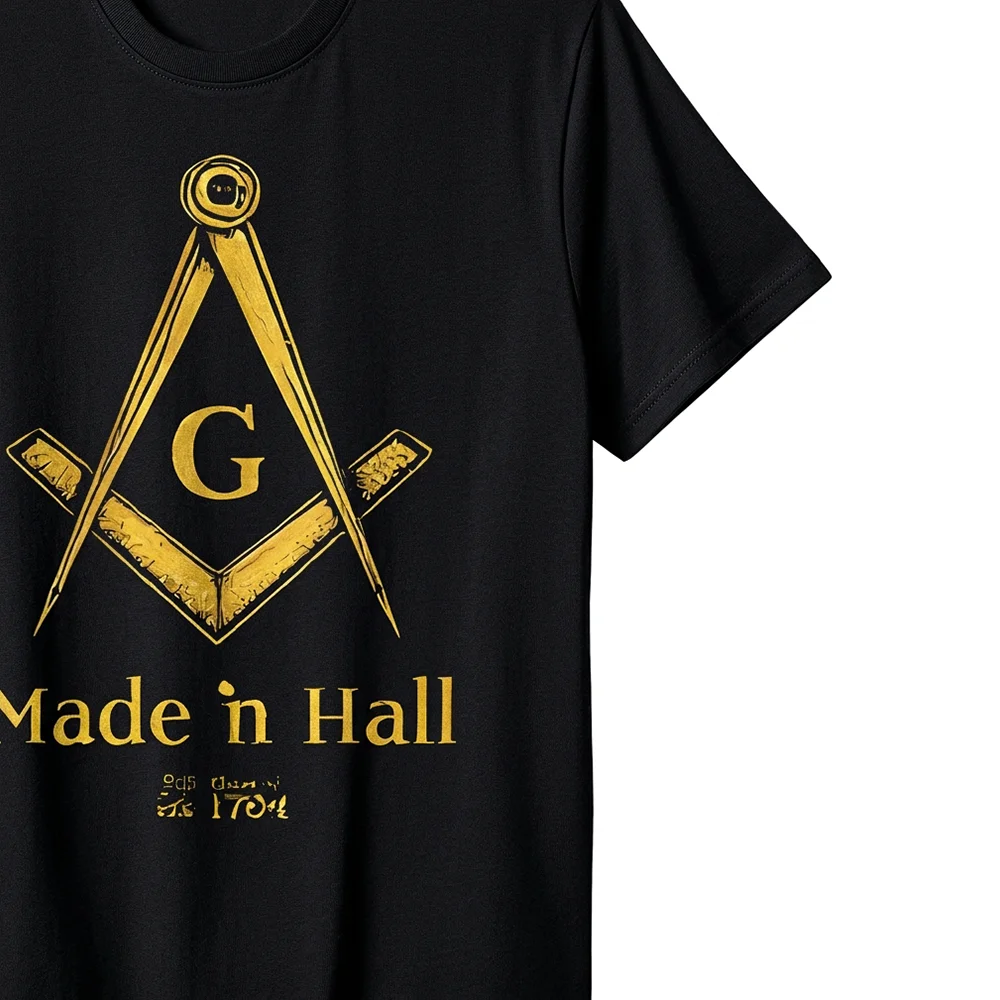Personalized black Masonic T-shirt with gold Compass and Square artwork, “Made in Hall” design, and custom name print.
