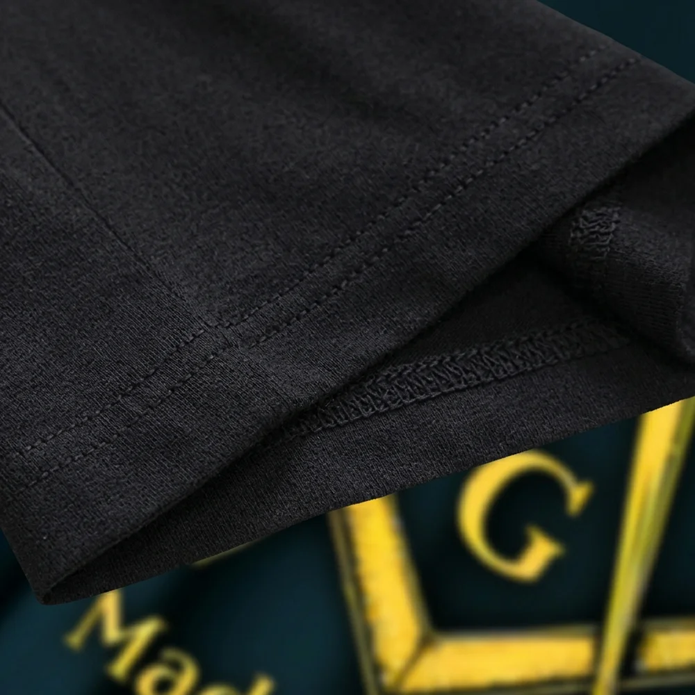 Black Masonic lodge shirt with gold Compass and Square print and “Made in Hall” design for Freemason gatherings.