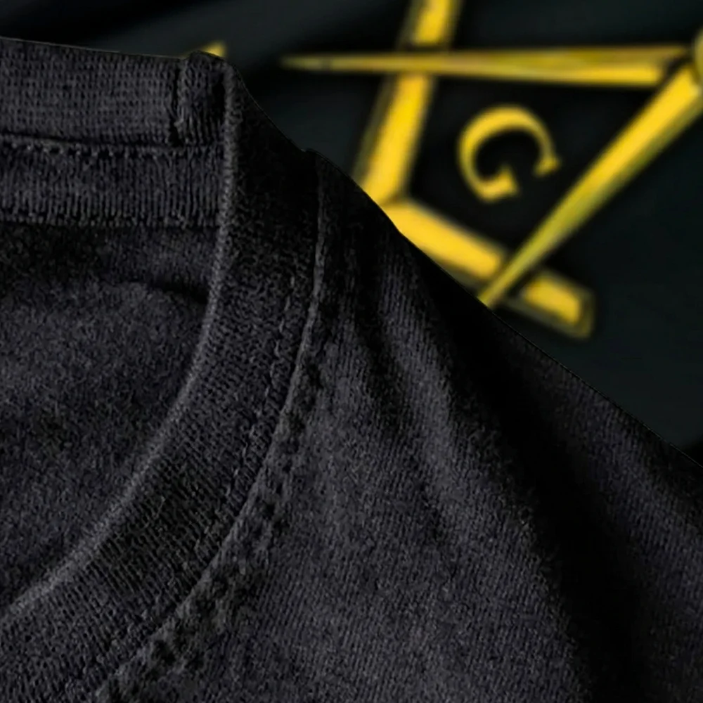 Black Masonic graphic T-shirt with gold Square and Compasses symbol and “Made in Hall” Freemason design.